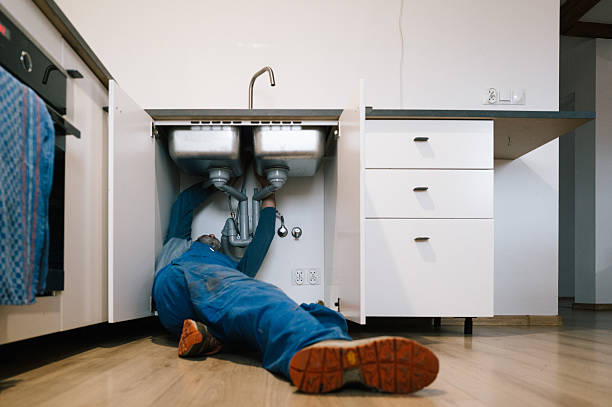 Professional Drain Cleaning technician working in Summerfield, IL